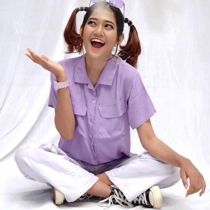 Kaveri Mehta, Lead Design Curator at PebbleGroveField, reviewing corporate floral arrangements